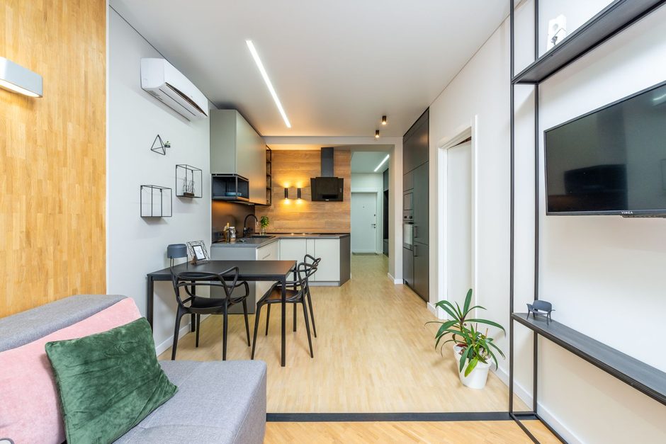 Photo by Max Vakhtbovych on Pexels Bright modern living room with wall-mounted aircon and clean wooden floor. Photo by Max Vakhtbovych on Pexels