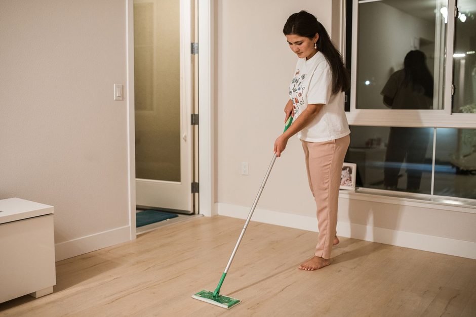 Photo by RDNE Stock project on Pexels Woman mopping a clean wooden floor in a bright apartment. Photo by RDNE Stock project on Pexels