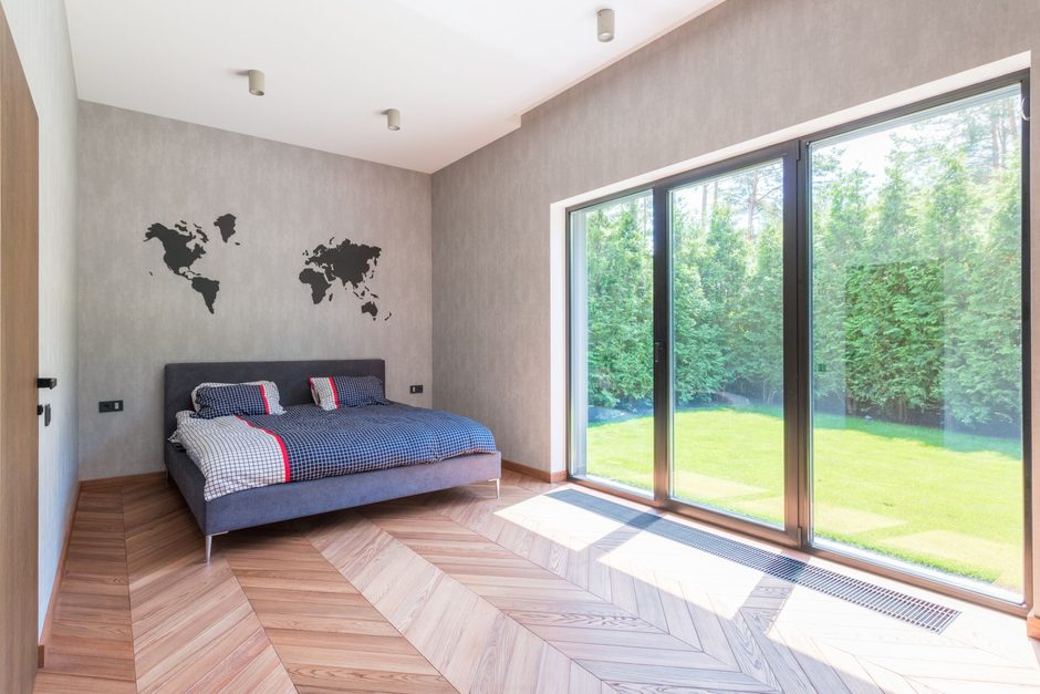 Photo by Max Vakhtbovych on Pexels Bright bedroom in a landed house with sliding glass doors opening onto a green garden. Photo by Max Vakhtbovych on Pexels