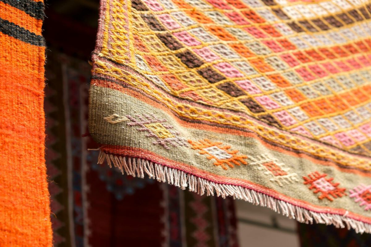 Vibrant Turkish rug showcasing intricate patterns in Bergama, İzmir, Türkiye.