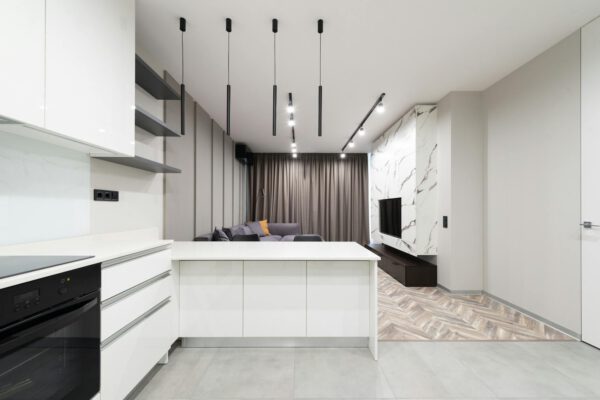 Bright and modern studio apartment with sleek furnishings and contemporary decor.