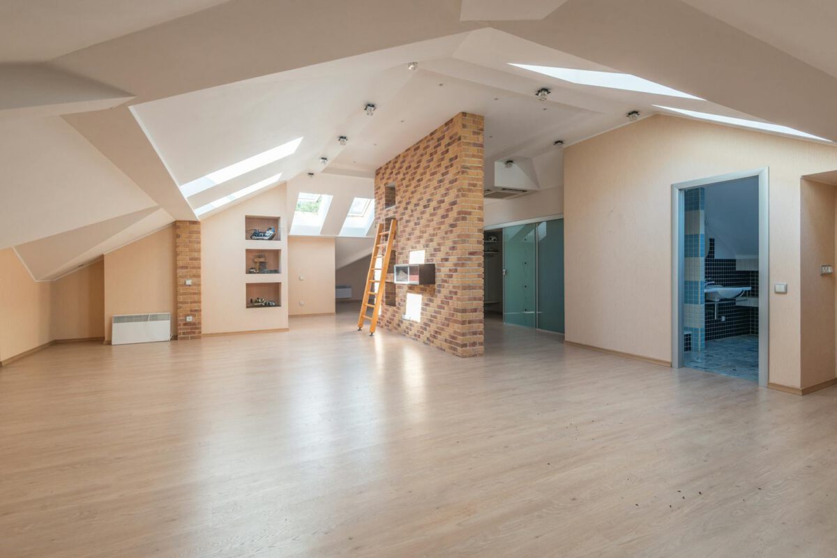 Explore this bright, spacious modern attic apartment with skylights and contemporary design.
