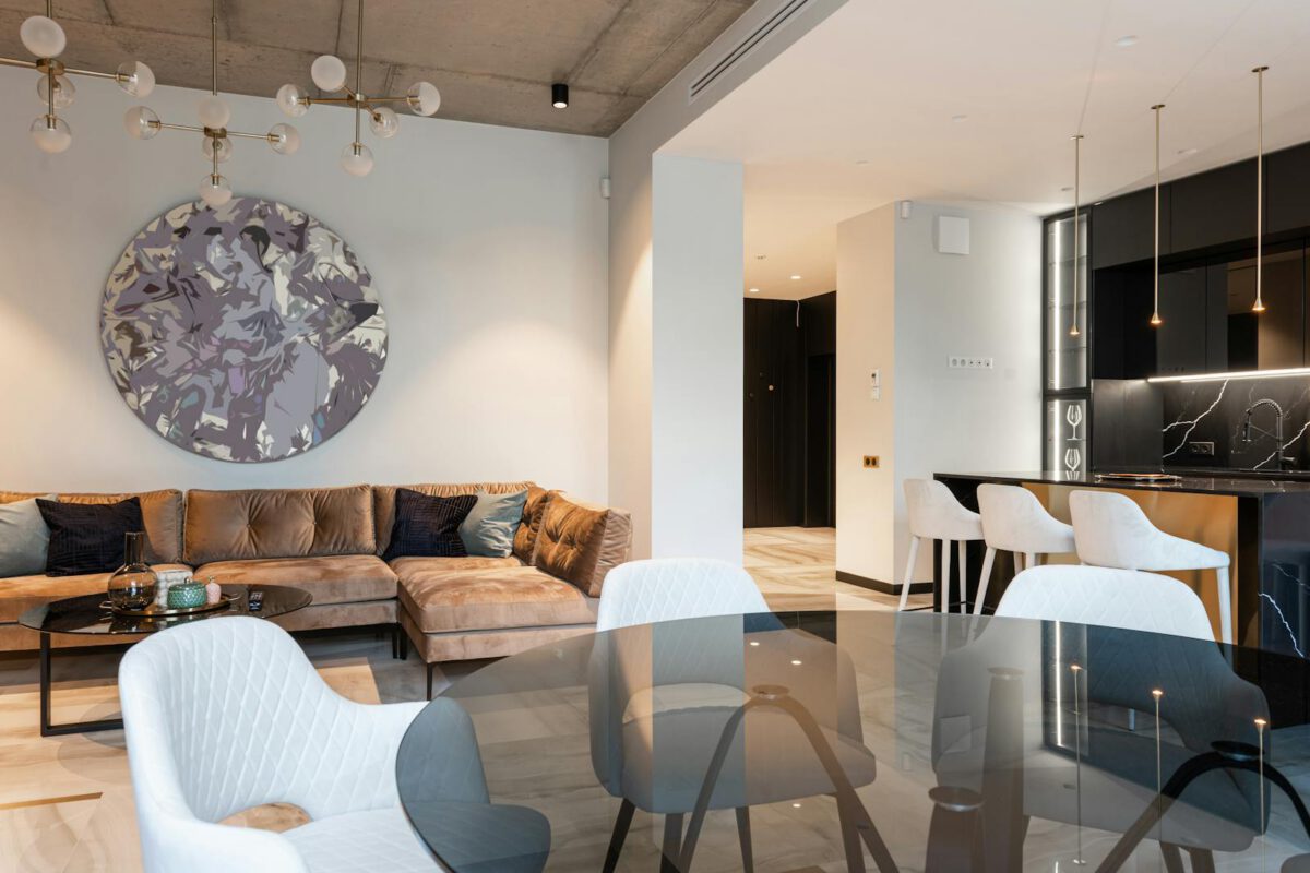 Spacious modern living room with chic decor and open kitchen